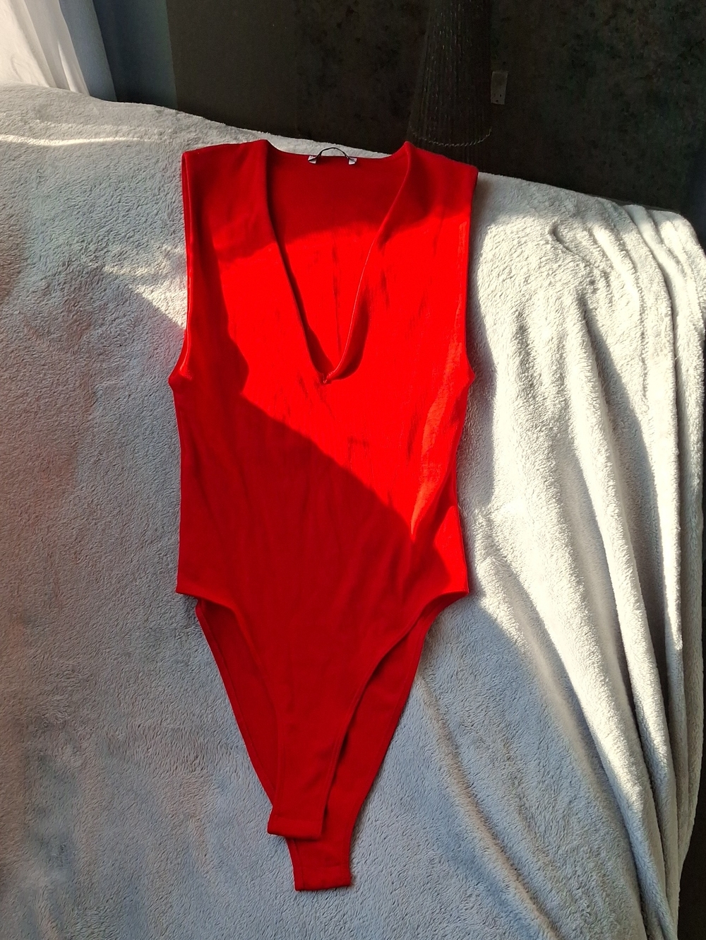 Red Sleeveless V-Neck Womens One-Piece Bodysuit